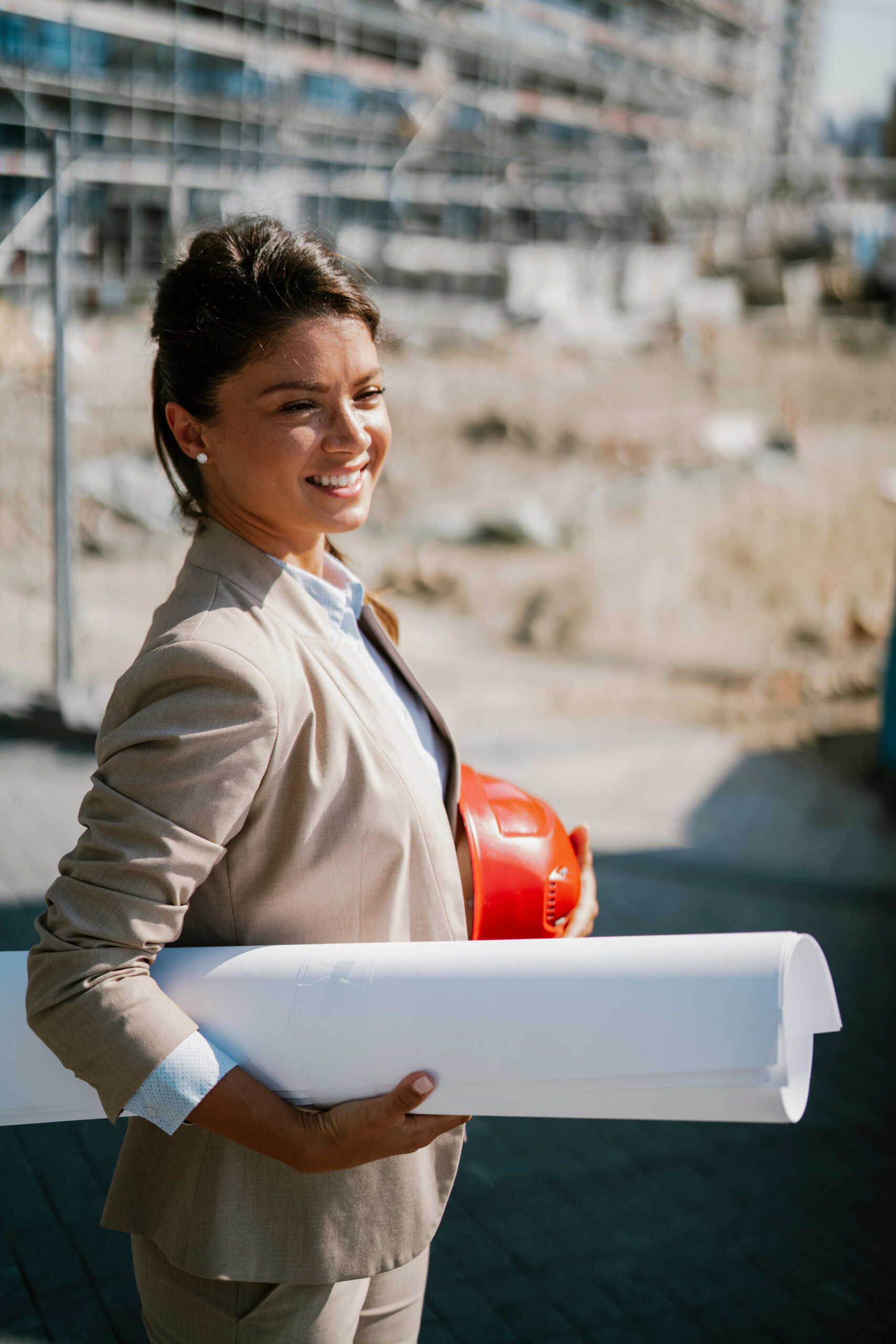 Young ambitious architect. Female engineer with her equipment.